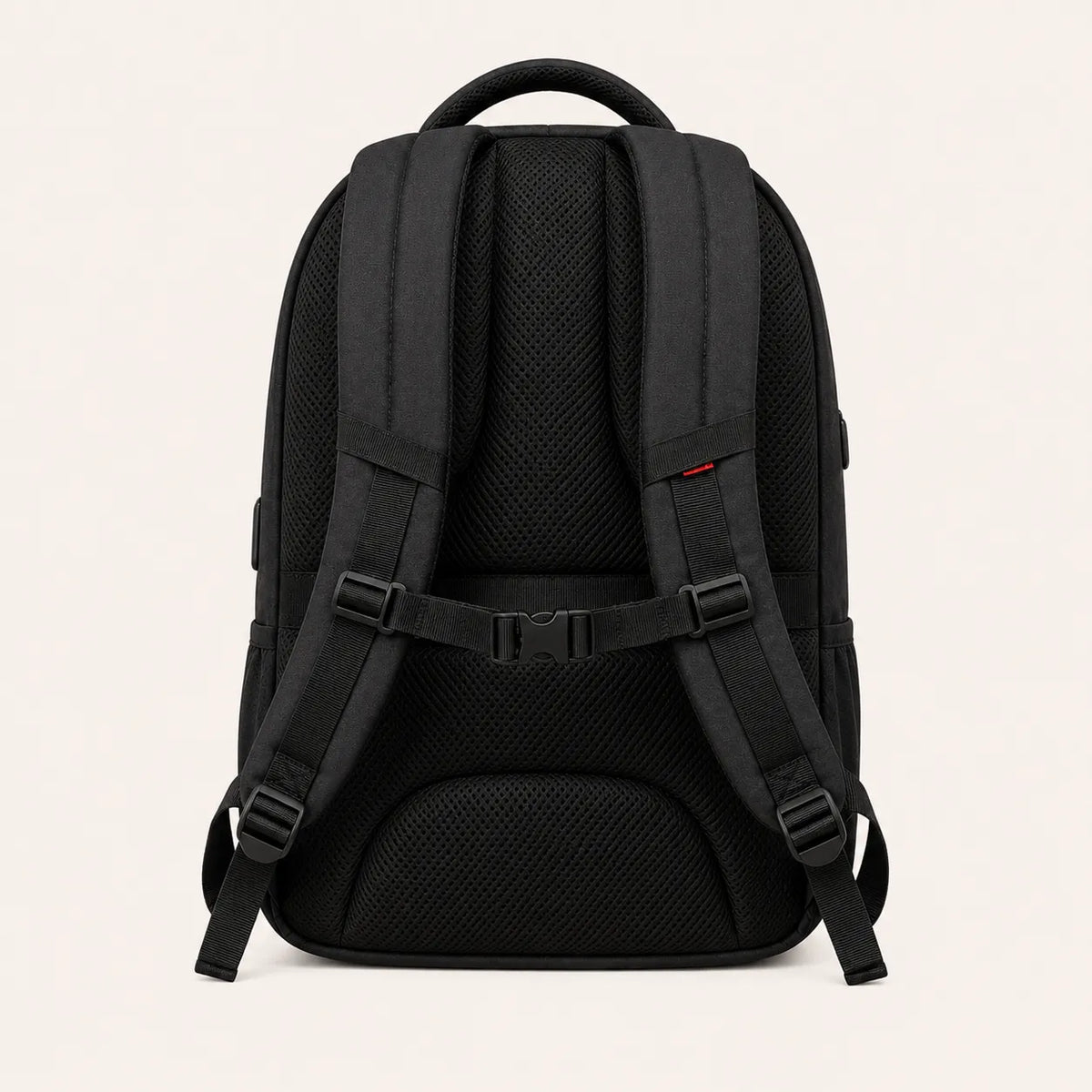 Vue arriere d un sac a dos ordinateur homme noir avec bretelles rembourrees dos respirant et sangle poitrine ajustable