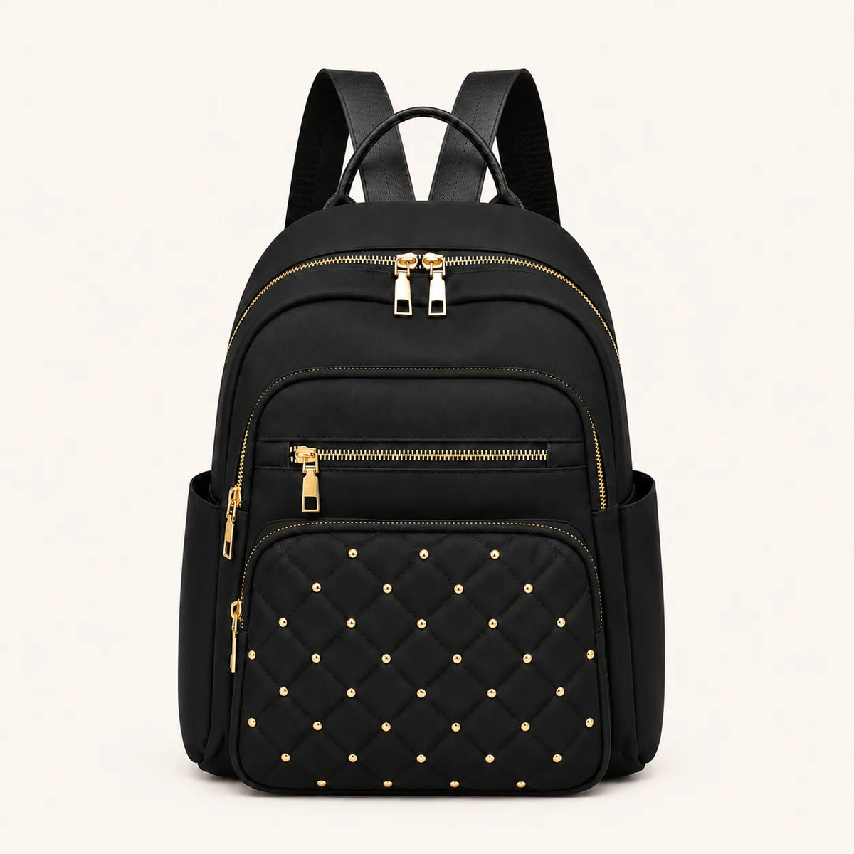 Sac à dos femme noir matelassé avec détails dorés et multiples compartiments