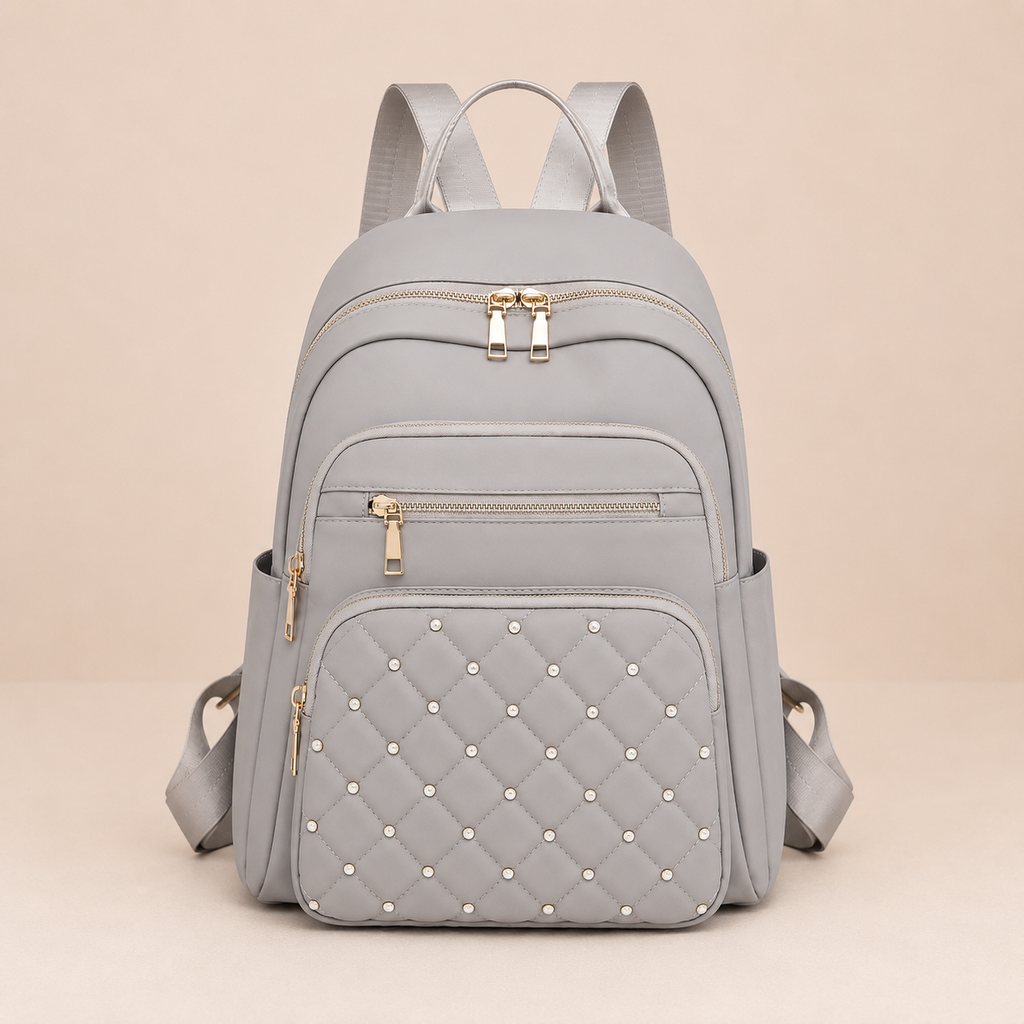 Sac a dos femme gris clair en nylon avec poches zippees et details matelasses