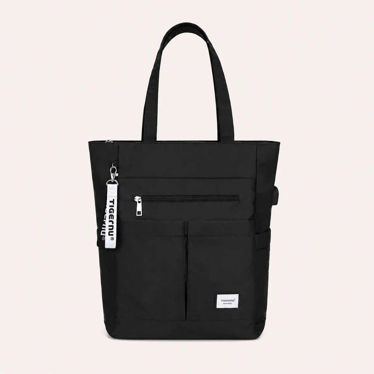 Sac ordinateur femme noir TIGERNU avec multiples poches extérieures, fermeture zippée et grande capacité de rangement pour ordinateur portable.