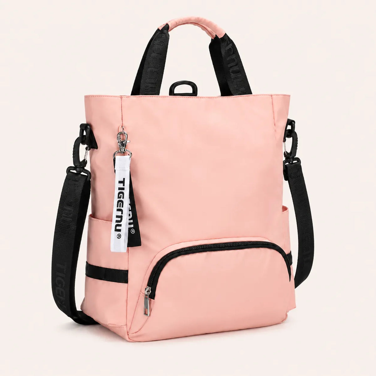 Sac ordinateur femme rose pâle en nylon avec poignées, bandoulière amovible et poche zippée avant